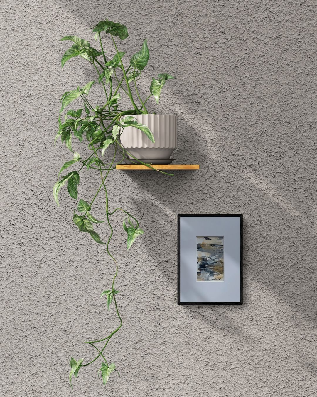 Dune | neutral & gold abstract painting on paper | mounted and unframed | A2 | framed on wall next to a pot plant | Chris Moss Art