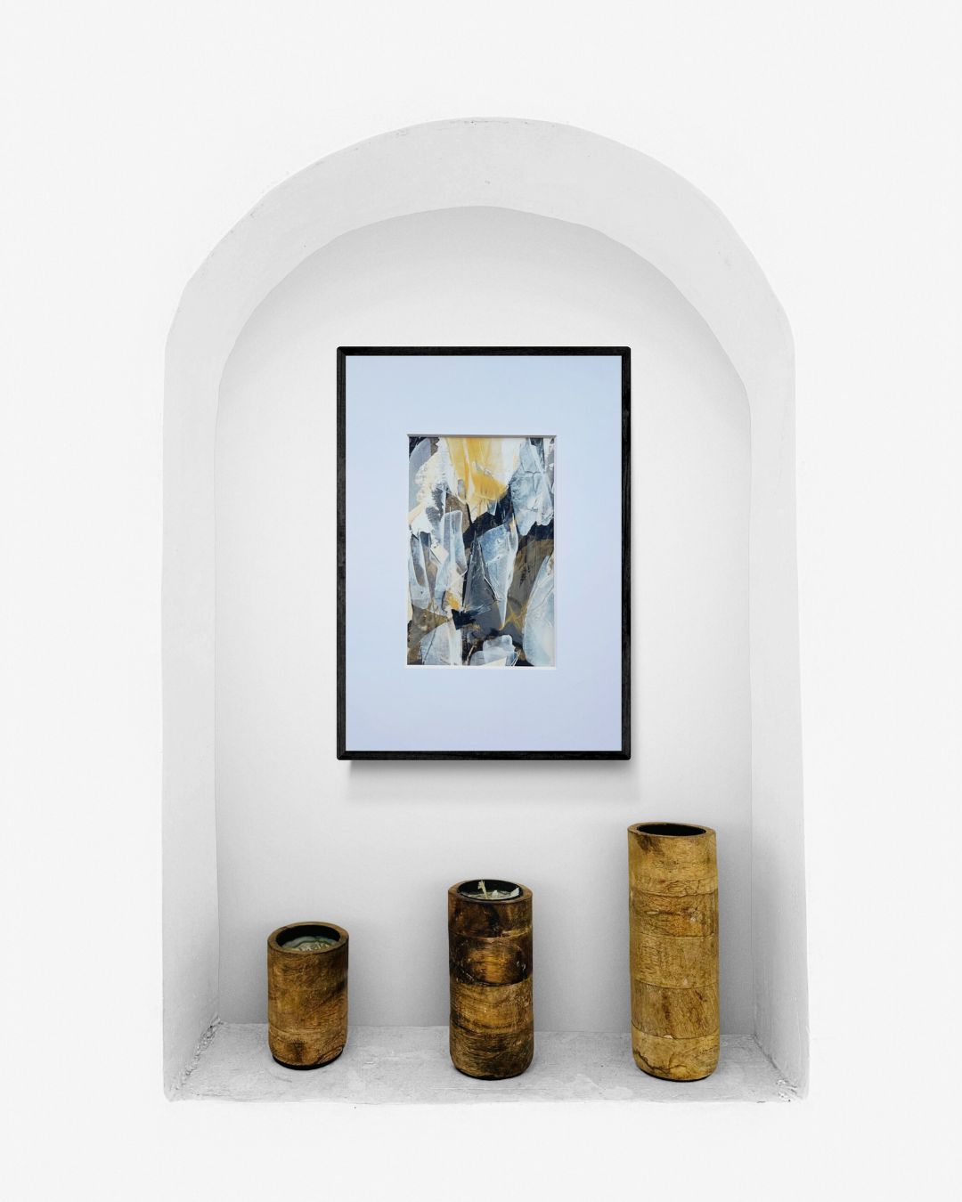 Embers | Neutral & gold original abstract painting on paper | mounted to A3 | room mock up in alcove with black frame and decorative pots | Chris Moss Art