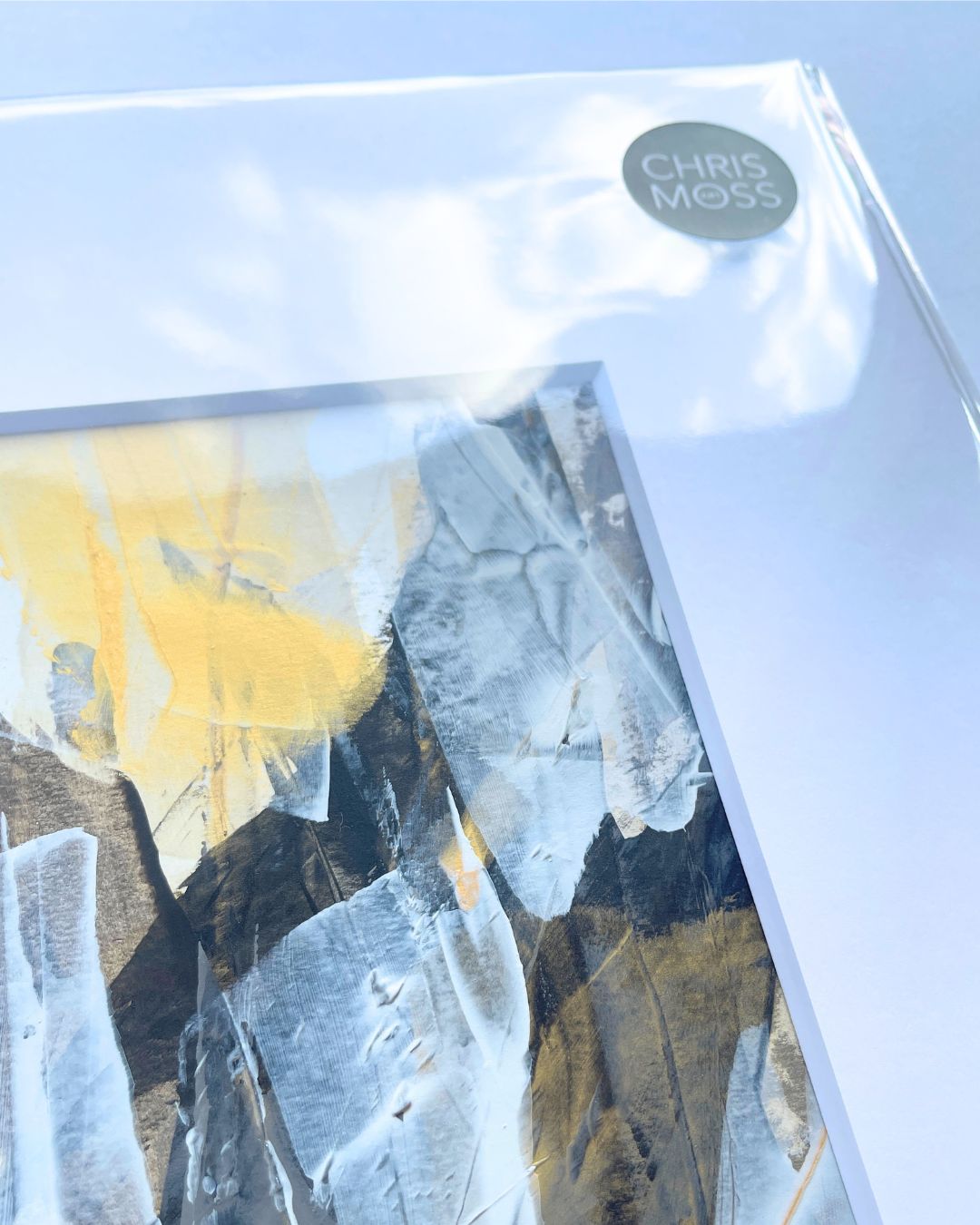 Embers | Neutral & gold original abstract painting on paper | mounted to A3 | close up of packaged front with logo sticker | Chris Moss Art