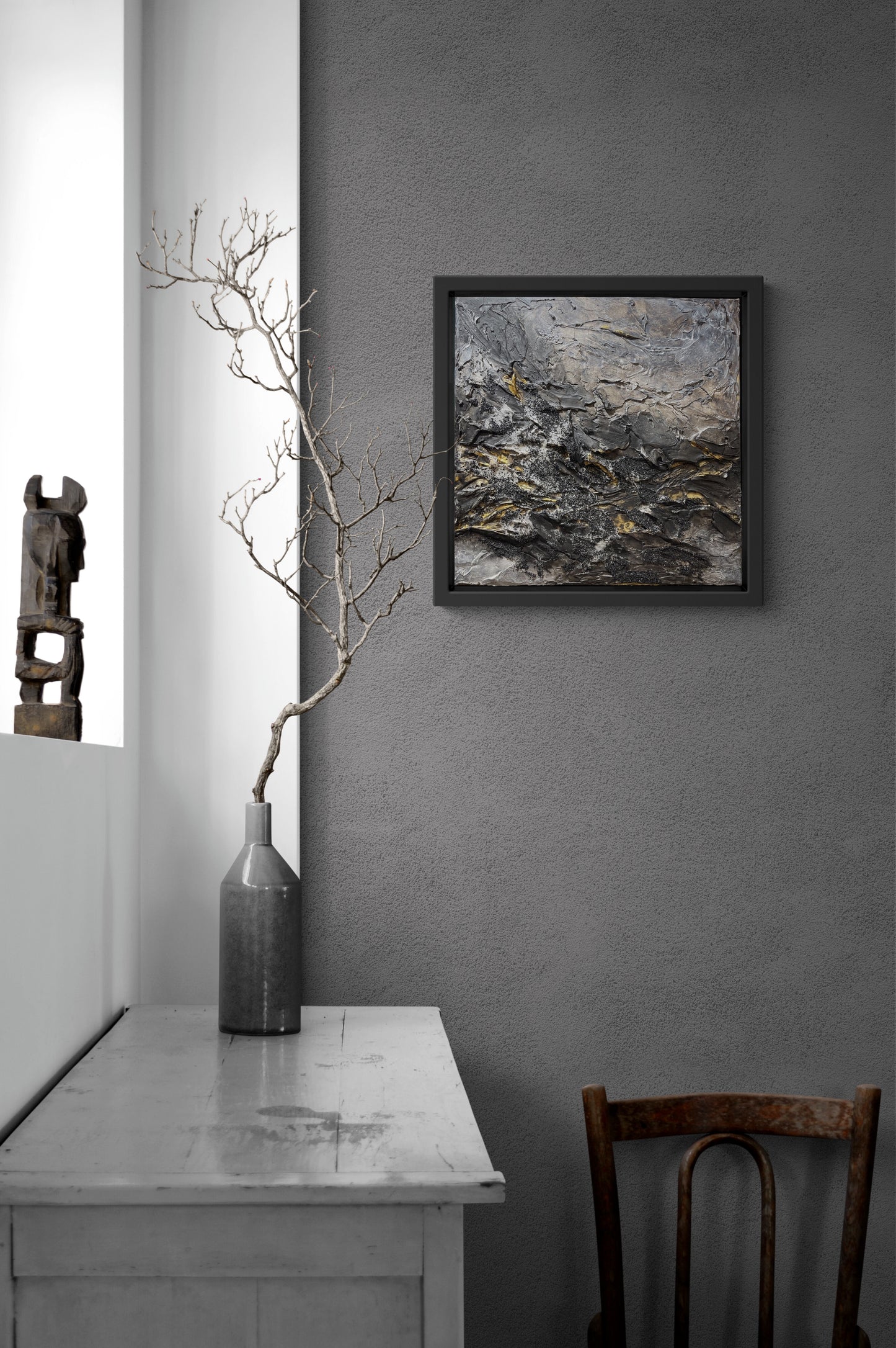 Omen | Original textured abstract artwork on canvas with dark neutral palette, gold-leaf and sand |7070cm | ready to hang in black Obeche wood frame. Chris Moss Art