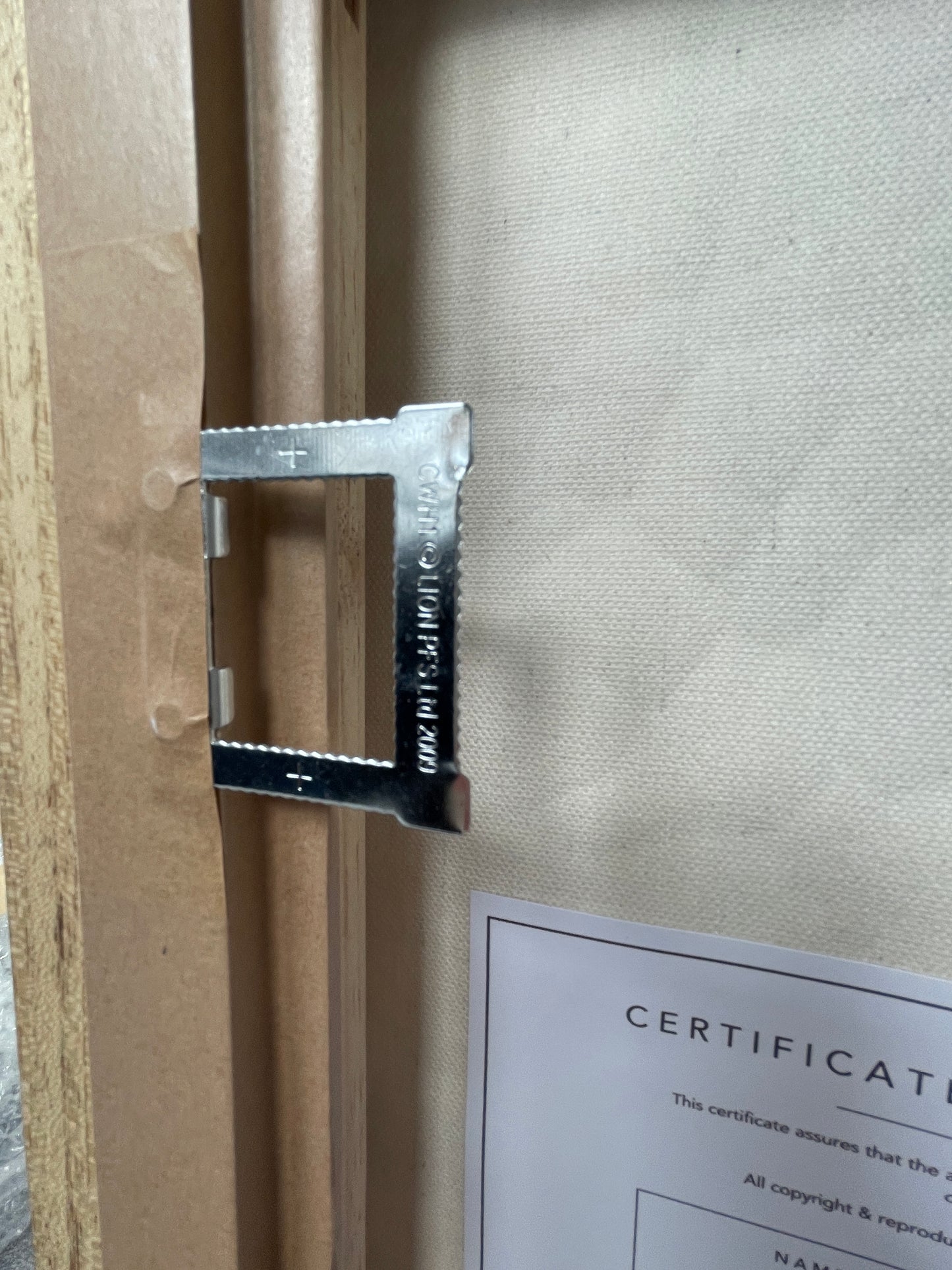 Omen | Original textured abstract artwork on canvas with dark neutral palette, gold-leaf and sand |7070cm | ready to hang in black Obeche wood frame. Chris Moss Art