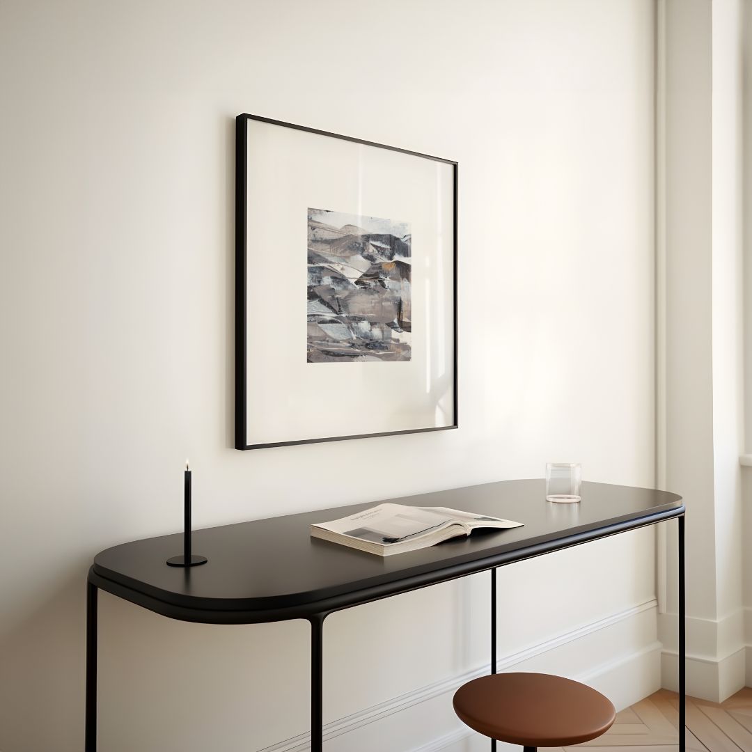 Vesper | neutral gold taupe black and white abstract fine art print | styled in black frame on cream wall over a console desk | Chris Moss Art