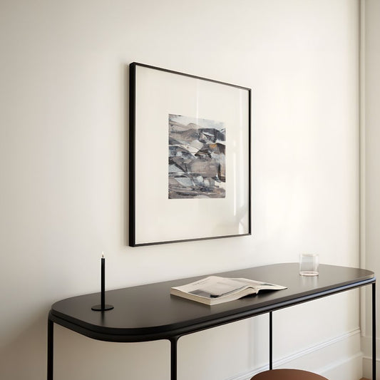 Vesper | neutral gold taupe black and white abstract fine art print | styled in black frame on cream wall over a console desk | Chris Moss Art