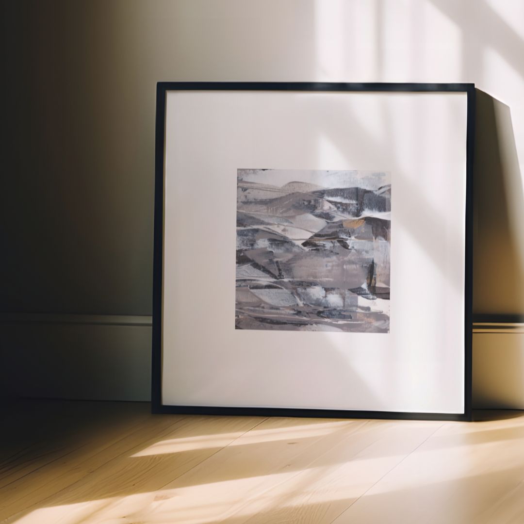 Vesper | neutral gold taupe black and white abstract fine art print | styled in black frame against grey wall with filtered shadowy light | Chris Moss Art