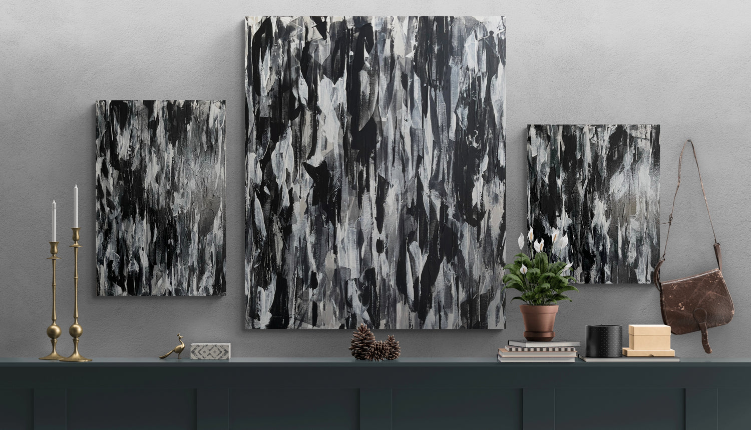 A trio if dark, monochrome abstract artworks on canvas, inspired by the shadows of our subconscious